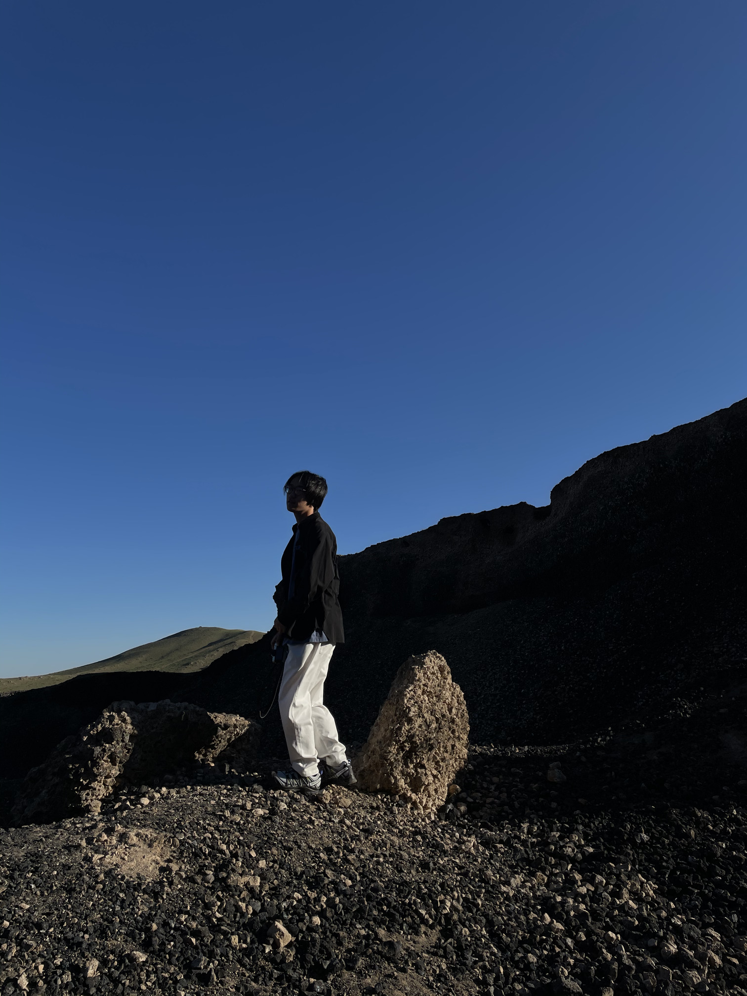 Standing on Volcanic Rocks